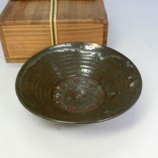 G248: Japanese Old Pottery Ware Flat Tea Bowl With Golden Repair. photo