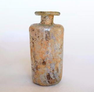 Ancient Roman Glass Cylindrical Unguentarium Flask; Circa 3rd Century Ad. photo