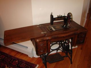 Antique Home Treadle Sewing Machine photo