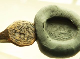 Ancient Bronze Ring With Bird Image (401) photo
