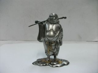 Budai Or Hotei Of The Pure Silver.  One Of Japanese Seven Lucky Gods. photo