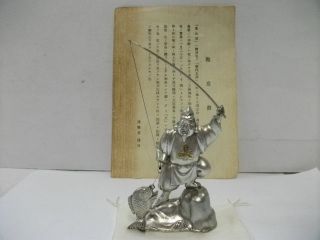 A God Of Ebisu (mythology) Of The Silver.  One Of Japanese Seven Lucky Gods. photo
