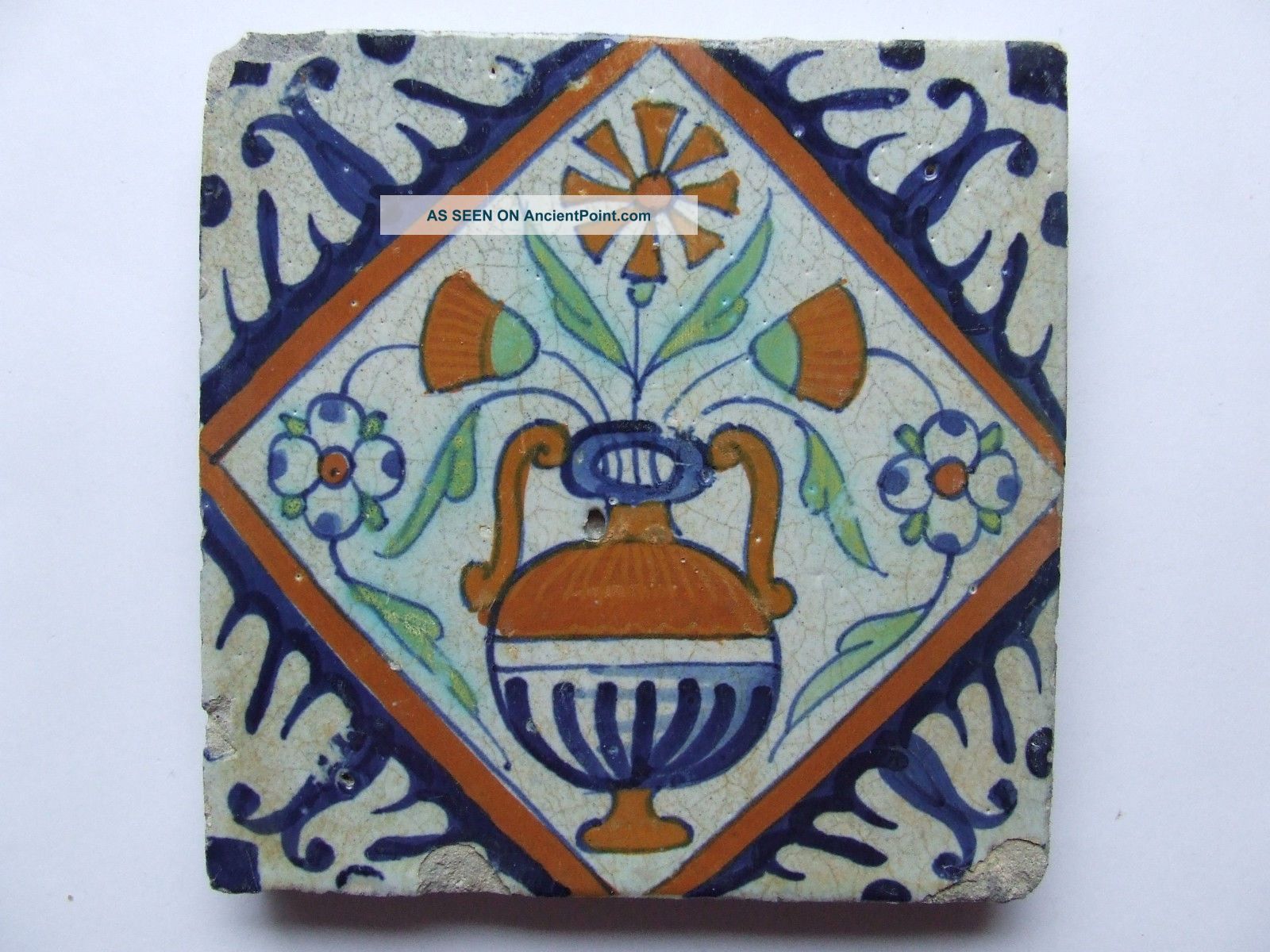 A Very Old Dutch Delft Tile With Flower - Pot In Diamond, , Tiles photo