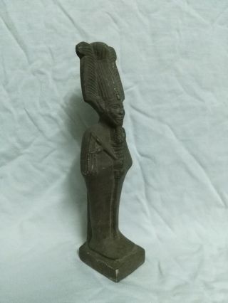 Ancient Egyptian Brown Statue Of God Amun photo