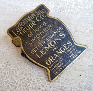 Antique Lagomarcino Grupe Co.  Iowa Adv.  Clip Setter Brands Lemons And Oranges photo