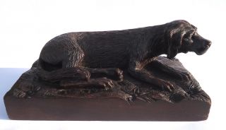 Exceptional Antique Black Forest Carving Of A Resting Dog Sculpture photo