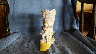 Old Porcelin Boot Vase With Great Detail And Has A Cherub Truly Piece photo