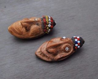 Old Guinea Seed Pod Carvings Miniature Mask photo
