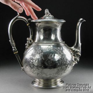 Tiffany & Co.  Sterling Silver Coffee Pot,  Engraved Design,  Raised Masks,  19th C. photo