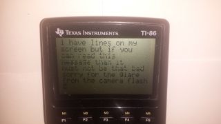 Ti - 86 Graphing Calculator (lines On Screen & Is Missing Cover) (only) photo