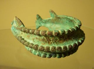 Ancient Zoomorfic Bronze Bracelet. photo