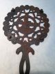 Antique Cast Iron Footed Round Trivet With Hearts And Child Design Trivets photo 2