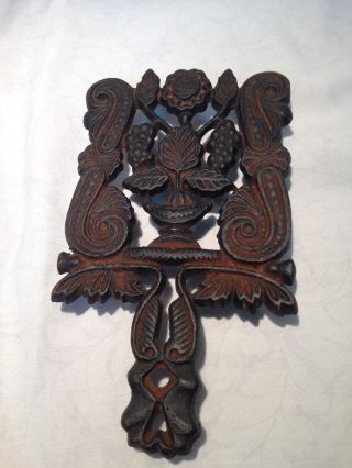 Cast Iron Footed Trivet With Grapes And Leaf Design photo