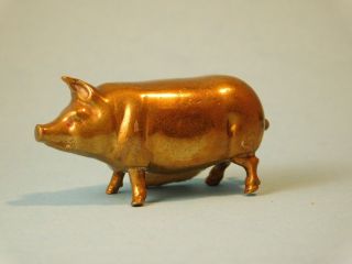 Antique Figural Brass Pig Turning Tail Sewing Fabric Tape Measure photo