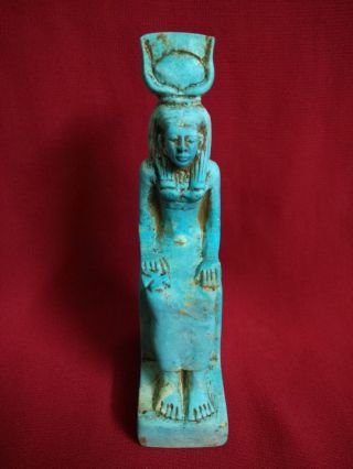 Ancient Egyptian Statue Of Setting Isis (380–362 Bc) Holding Key Of Life photo
