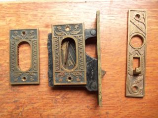 Antique Fancy Bronze Single Pocket Sliding Door Pulls & Lock Pat.  1886 photo