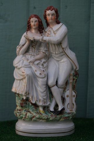 Mid 19thc Staffordshire Male & Female Figurines With Instruments C1860s photo