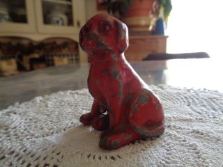 Vintage Metal Red Painted Dog Sitting photo