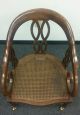 Antique Vintage Reddish Brown Wood Caster Chair W/ Cane Seat Unknown photo 1