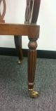 Antique Vintage Reddish Brown Wood Caster Chair W/ Cane Seat Unknown photo 3