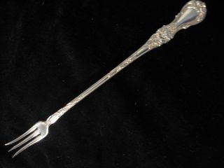 Silverplated Pickle Fork - Pat.  1902 - R.  Wallace - Floral Pattern photo