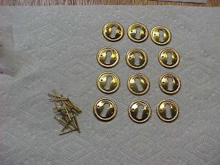 12 Round Stamped Brass Key Hole Drawer Escutcheons With Pins photo
