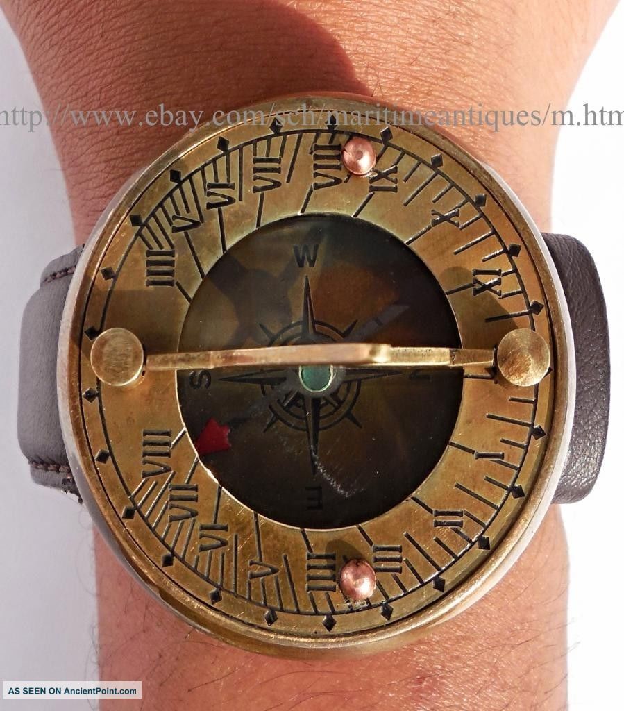Antique Style Brass Leather Wrist Sundial Compass. Compasses photo