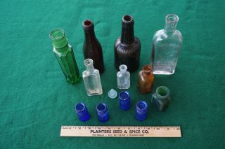 Antique Vintage Embossed Apothecary And Other Bottles,  Late 1800s/early 1900s photo