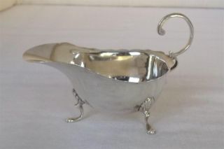 A Solid Sterling Silver Sauce Or Cream Boat London 1939 By Harrods Ltd. photo