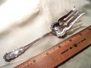 Sterling Silver Fancy Sliced Meat Serving Fork,  Unknown Maker photo