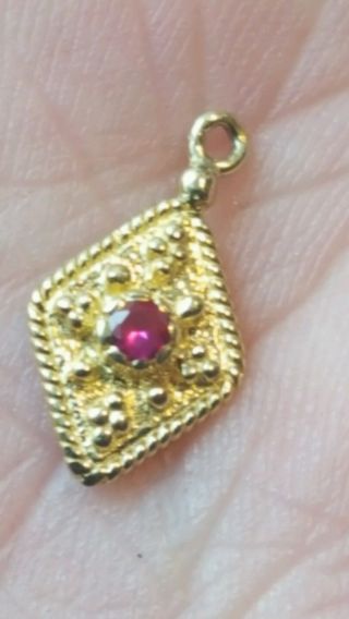 Roman Solid Gold Small Pendant With Ruby photo