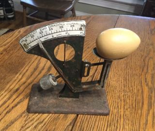 Vintage Primitive Mascot Egg Grading Scale With Wooden Egg,  Circa Early 1900s photo