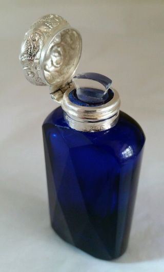 A Cut Glass Bristol Blue Scent Bottle.  Sterling Silver Mount.  Birmingham 1902 photo