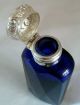 A Cut Glass Bristol Blue Scent Bottle.  Sterling Silver Mount.  Birmingham 1902 Bottles photo 1