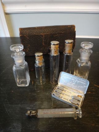 Antique Medical Hypodermic Needle Syringe With Miniature Apothecary Bottles Case photo