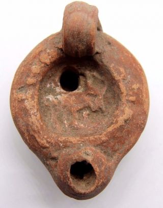 Ancient Roman Pottery Votive Oil Lamp With Bull 1st - 2nd Century Ad photo