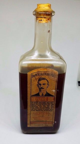 Antique Medicine Bottle W/ Label,  Cork,  Contents Quack Medical Cure All photo