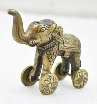 1900s Indian Antique Hand Crafted Engraved Brass Elephant On Wheels Figurine photo