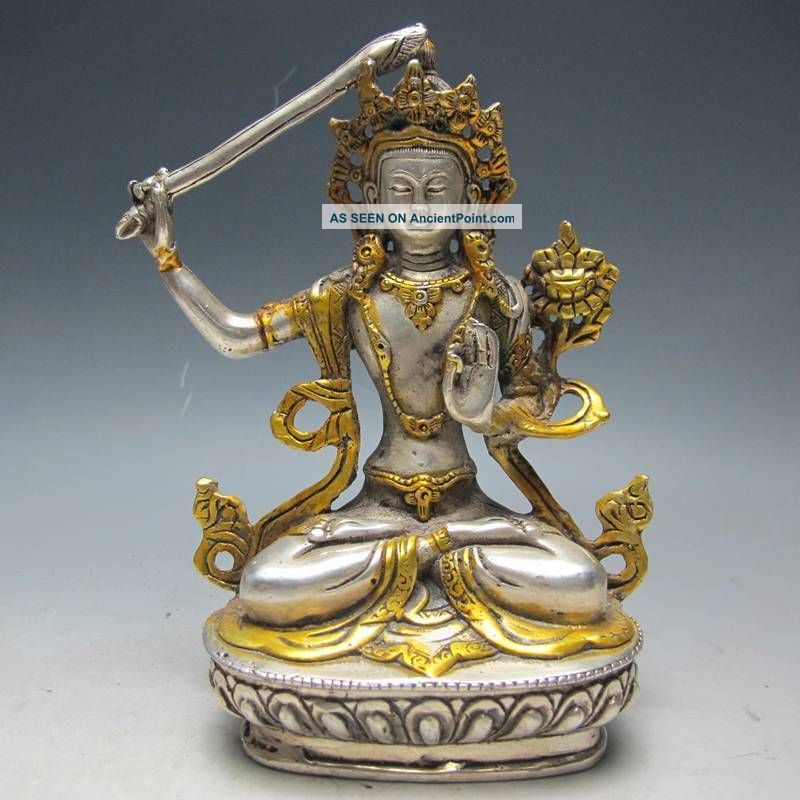 Chinese Silver Bronze Gilt Tibetan Buddhism Statue - - - Manjushri Buddha See more Chinese Silver Bronze Gilt Tibetan Buddhism St... photo