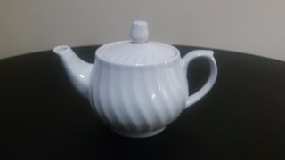 White Porcelain Creamer With Removable Top photo