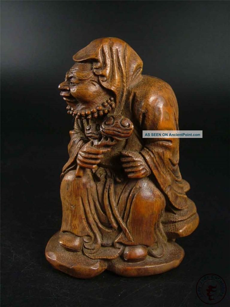 Antique Chinese Bamboo Root Carved Statue Damo Buddha Holding Ruyi Auspicious Buddha photo