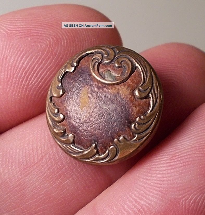 Antique Art Nouveau Brass Button With Leather Insert Background Buttons photo