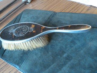 Antique Silver Mounted Hair Brush With Applique Silver Decoration. photo