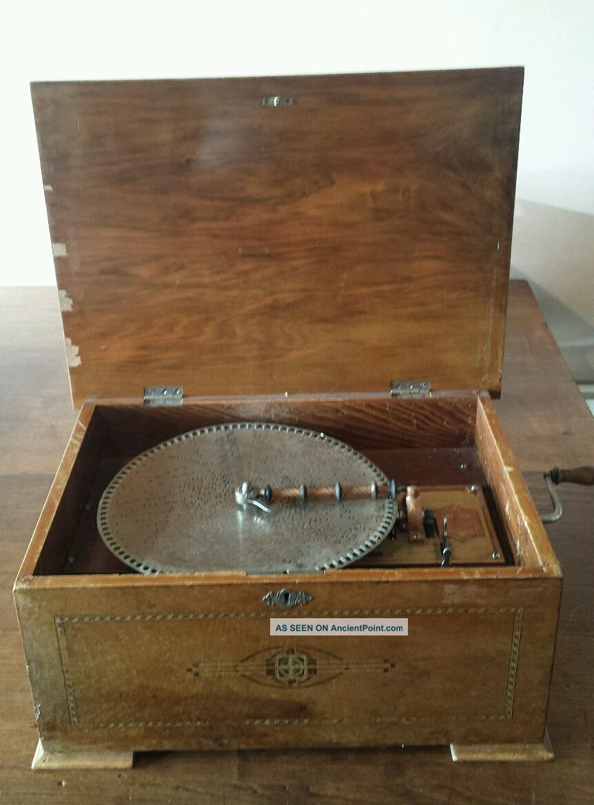 An Antique Walnut Cased Disc Playing Music Box And Discs Circa 1890. Other Antique Instruments photo