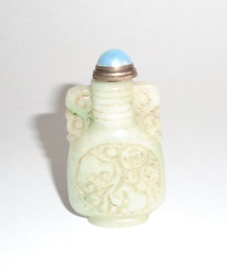 Pale Green Carved Stone Snuff Bottle photo