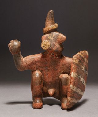 A Fine Pre - Columbian Nayarit Polychrome Squatting Figure Of A Warrior/ballplayer photo