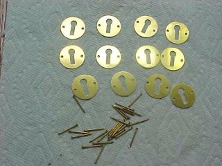 12 Stamped Brass Plain Round Key Hole Drawer Escutcheons With Pins photo