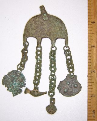 Ancient Bronze Separator Pendant With Amulets On Chains.  Viking Age. photo