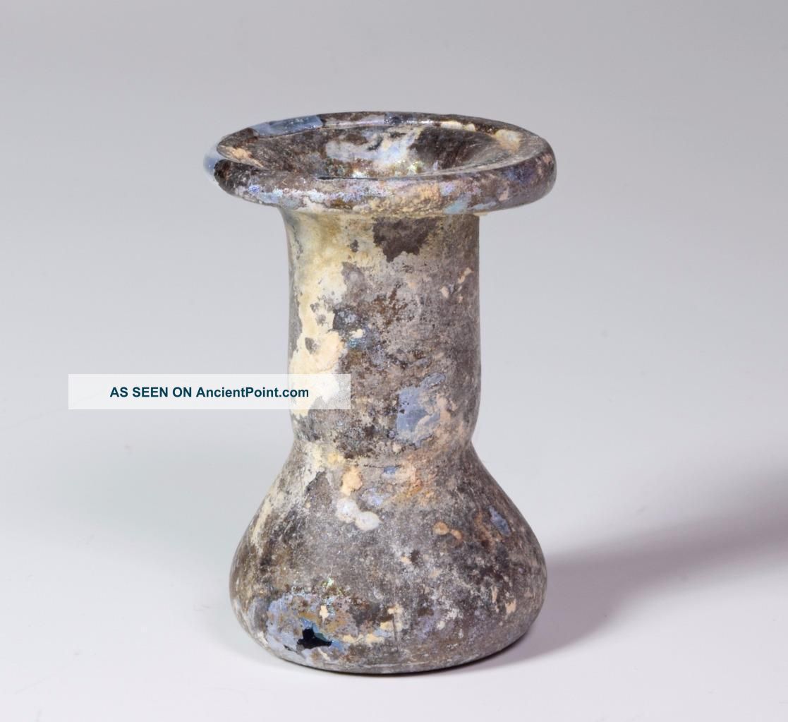 Roman Iridescent Glass Cosmetic Unguentarium Flask: 3rd Century Ad. Roman photo