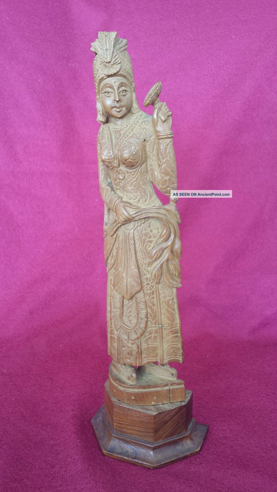 An Asia Wood Carved Statue The Americas photo